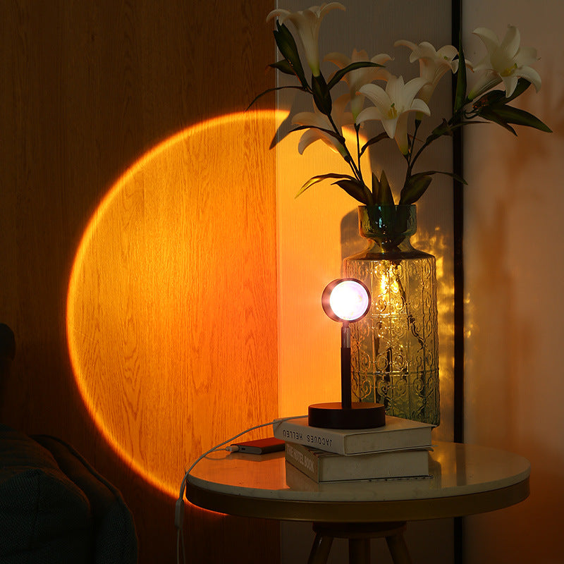 Dual head sunset projection lamp creating rainbow lighting effect