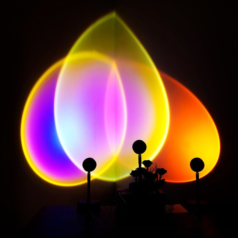 Sunset Projection Lamp creating colorful warm light effects on a wall, enhancing room aesthetics and ambiance.