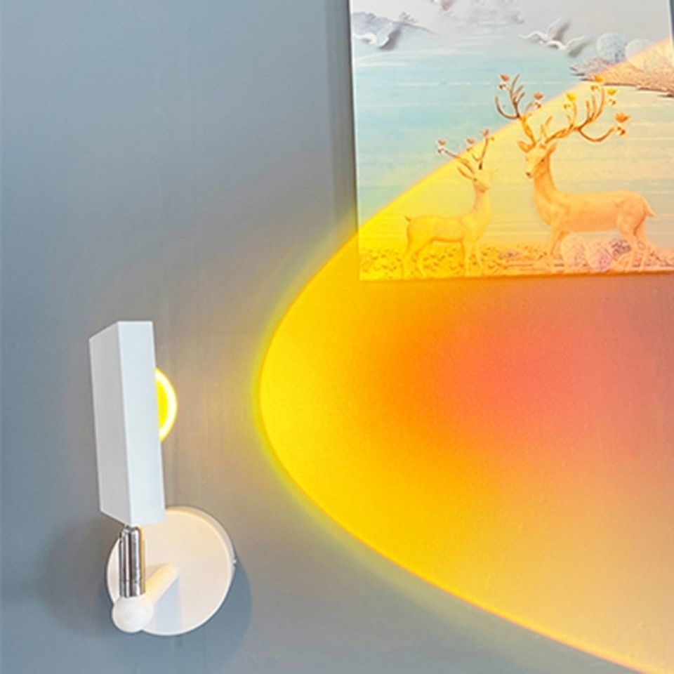 Sunset projection wall lamp creating warm ambient bedroom lighting