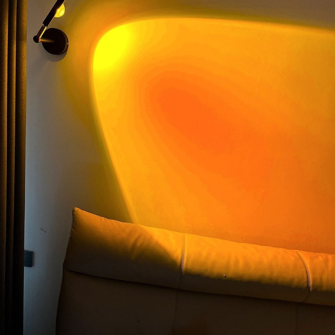 Sunset projection wall lamp creating warm ambient bedroom lighting