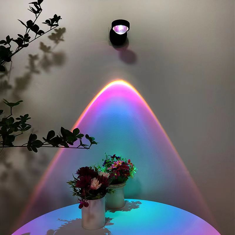 Rechargeable sunset wall lamp projecting warm ambient light