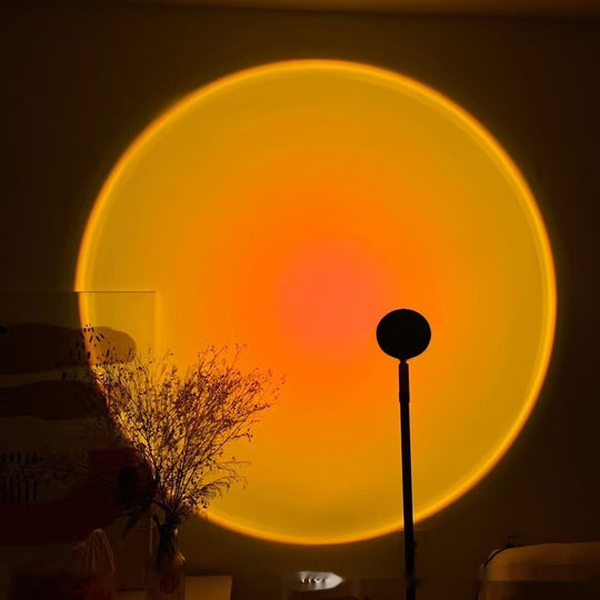 Warm sunset projection effect on wall from Sunset Projection Lamp, enhancing room aesthetics and ambiance.