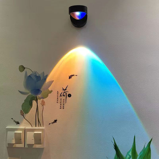 Rechargeable sunset wall lamp projecting warm ambient light