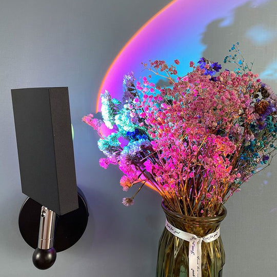 Sunset projection wall lamp creating warm ambient bedroom lighting