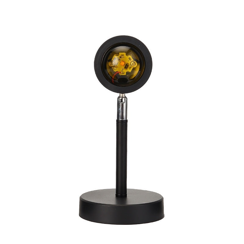 Sunset Projection Lamp showcasing a sleek design with a round head and adjustable stand.