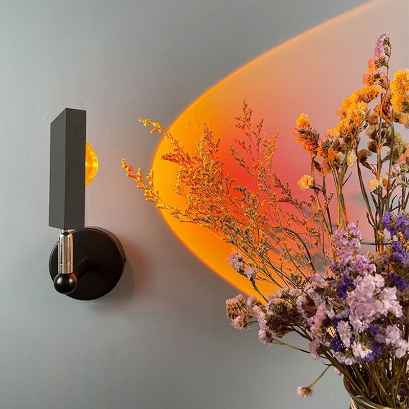 Sunset projection wall lamp creating warm ambient bedroom lighting